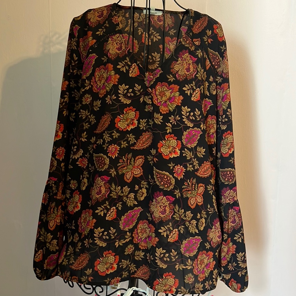 Maurice’s black long sleeve blouse with flower pattern.